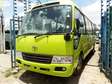 Clean Toyota Coaster bus on sale