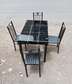 Black fine touch dining table with seats