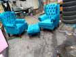 Tufted wingback arm chairs