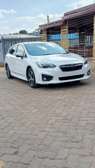 Subaru Impreza white color fully loaded 2019 model.