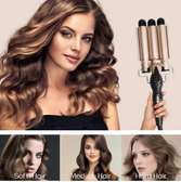 Hair curler with triple barrel iron