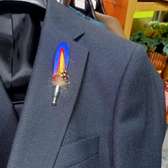 Red,black,pink,yellow&royal blue feathers lapel pins.