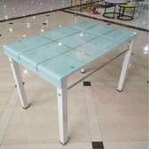 White dining table with a rubber legs
