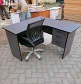 Office l shaped desk with an office mesh chair