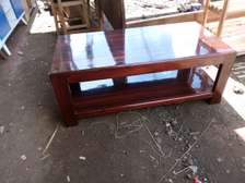 Coffee table with a closed bottom rack
