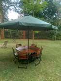 Garden shade with 6 chairs with cushions
