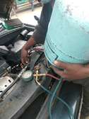AC gas refiling and repairs