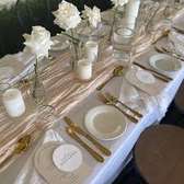 Elegant Gold Cutlery Table Setting with White Porcelain