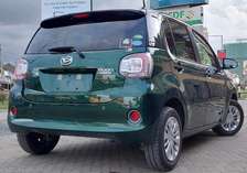 Make Daihatsu Boon 2020 model green very clean.