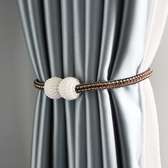 Magnetic curtain holders