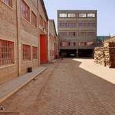 0.75 ac Warehouse with Backup Generator at Kyangombe Road