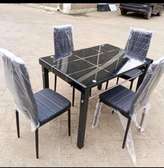 Home dining table with black chairs