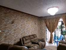 brick wallpaper for a living room wall