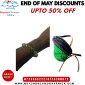 A green black kyondo and a green bracelet combo