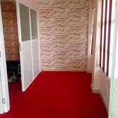Red wall to wall carpets.....
