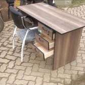 Three pullout drawers study table with an office chair