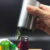 Stainless steel beer/ soda bottle top opener-  opening