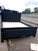 Classic 5 by 6 chesterfield bed on offer