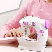 Mini handheld sewing machine