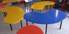 Bean shaped worktables for schools.