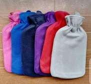 Hot water Bottle with a woolen cover.*