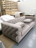 Round tufted back 3 seater sofa