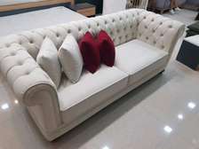 Latest off-white three seater chesterfield sofa