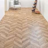 Herringbone laminate flooring.