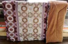 7 piece cotton/woolen duvet sets  with matching curtains.