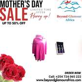 Women's pink poncho and purple earrings combo