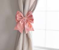 Bow tie curtain holder