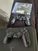 PS4 Slim 1TB (Used) - Excellent Condition.