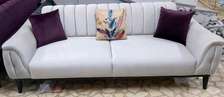Modern white three seater tufted sofa Kenya