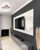 Black flutted wall panel wall unit interior design