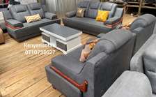 7 seater monster sofa with cup holders and a storage space.