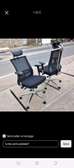 Office high back chair with a metallic back support