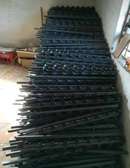 Electric fence strainer and w posts
