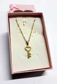 Womens Gold Tone Key pendant and earrings