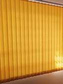 Yellow vertical blinds.