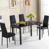 Home dining room table with sponged chairs