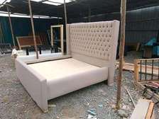 Executive tufted bed
