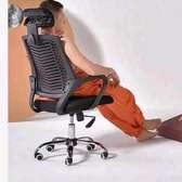 Computer office table chair with a headrest