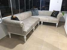 Five seater cream L shaped tufted sofa set