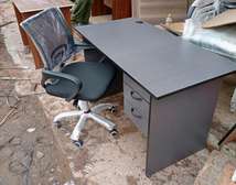 Office desk with a secretarial chair