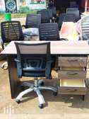 Home office desk with an office chair with adjustable height
