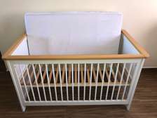 Kids cot bed with mattress, converts to bed