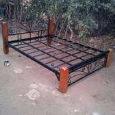 A preloved, gently used, heavy gauge, metallic, bed frame.