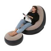 Inflatable seat with ottoman and pump