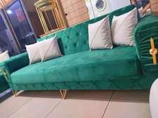 Modern green three seater chesterfield sofa