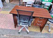 Wood computer desk and a swivel chair